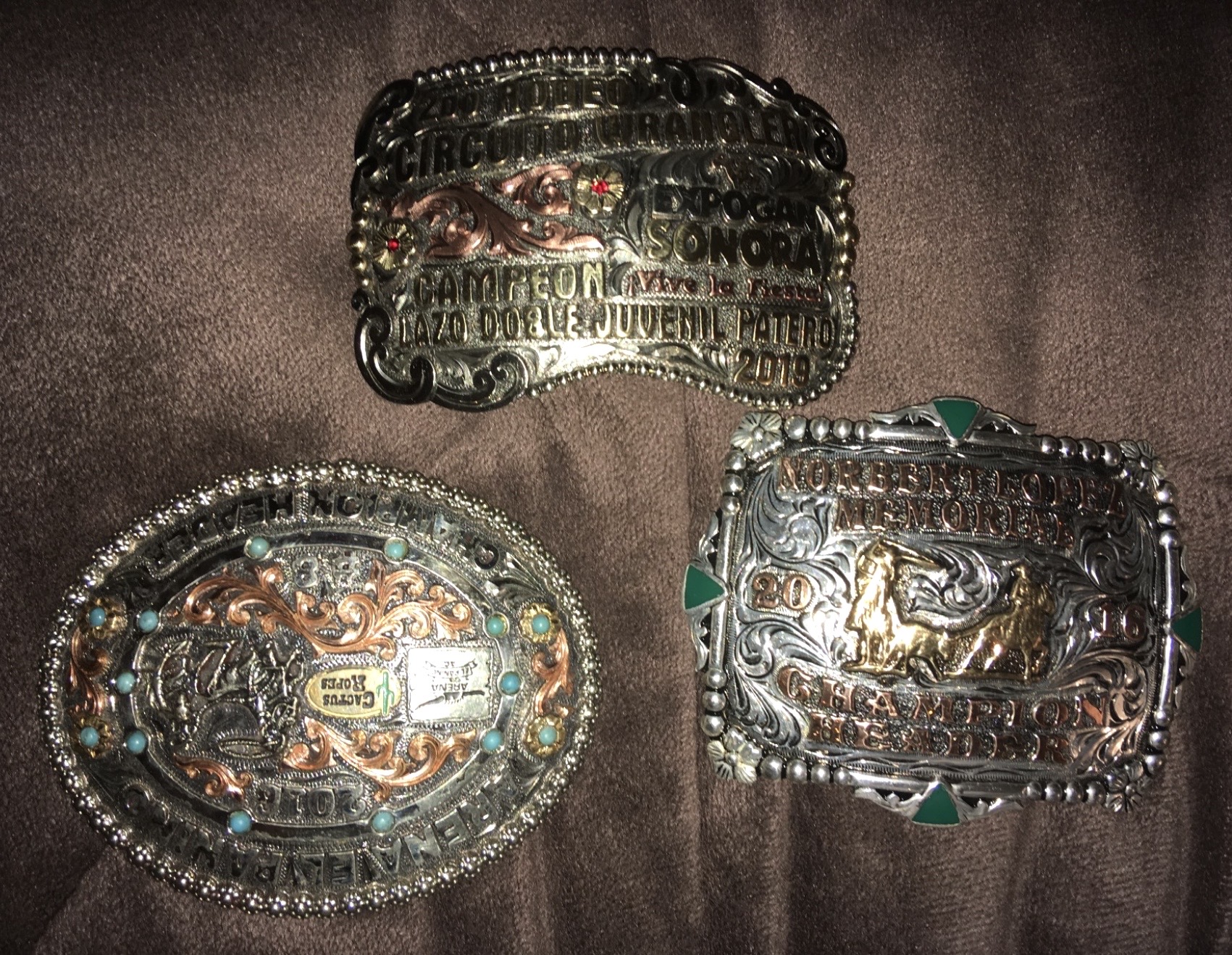Team roping award belt buckles